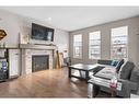 315 Evanston Way Nw, Calgary, AB  - Indoor Photo Showing Living Room With Fireplace 