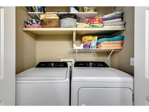 90 Valley Ponds Crescent Nw, Calgary, AB - Indoor Photo Showing Laundry Room