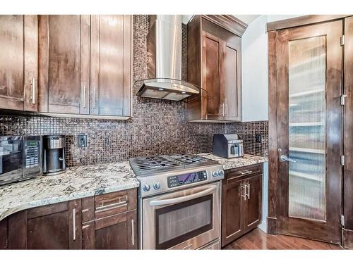 16 Rockcliff Point Nw, Calgary, AB - Indoor Photo Showing Kitchen With Upgraded Kitchen