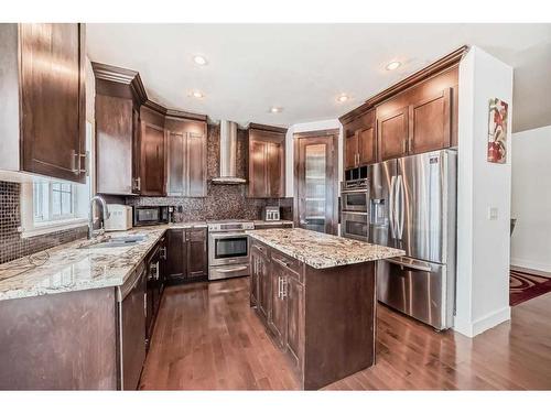 16 Rockcliff Point Nw, Calgary, AB - Indoor Photo Showing Kitchen With Stainless Steel Kitchen With Upgraded Kitchen