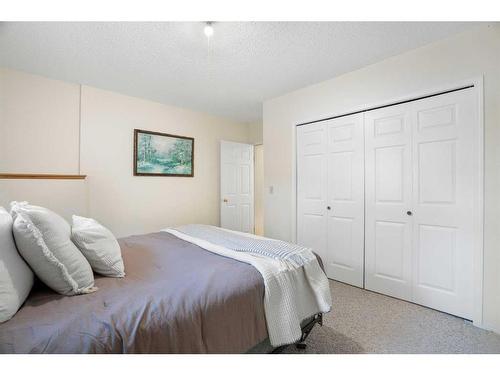 81 Shawinigan Road Sw, Calgary, AB - Indoor Photo Showing Bedroom