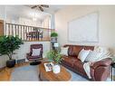 81 Shawinigan Road Sw, Calgary, AB  - Indoor Photo Showing Living Room 