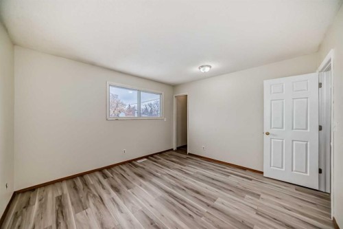 652 Queensland Drive Se, Calgary, AB - Indoor Photo Showing Other Room