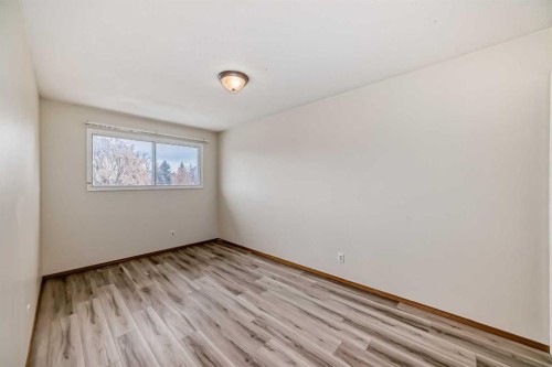 652 Queensland Drive Se, Calgary, AB - Indoor Photo Showing Other Room