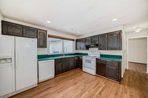 652 Queensland Drive Se, Calgary, AB - Indoor Photo Showing Kitchen