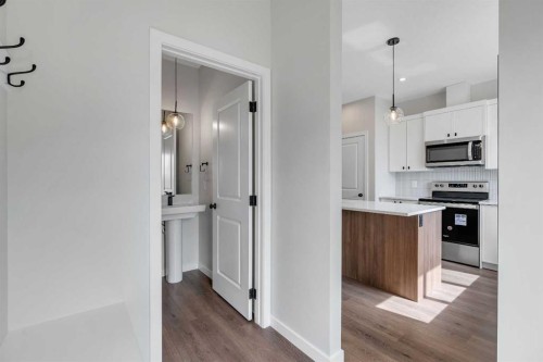 225 Heirloom Way Se, Calgary, AB - Indoor Photo Showing Kitchen