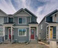 225 Heirloom Way Se, Calgary, AB  - Outdoor With Facade 