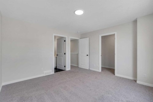 225 Heirloom Way Se, Calgary, AB - Indoor Photo Showing Other Room