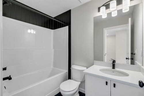 225 Heirloom Way Se, Calgary, AB - Indoor Photo Showing Bathroom