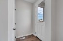 225 Heirloom Way Se, Calgary, AB  - Indoor Photo Showing Other Room 