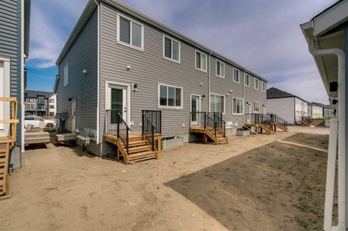 225 Heirloom Way Se, Calgary, AB - Outdoor With Exterior