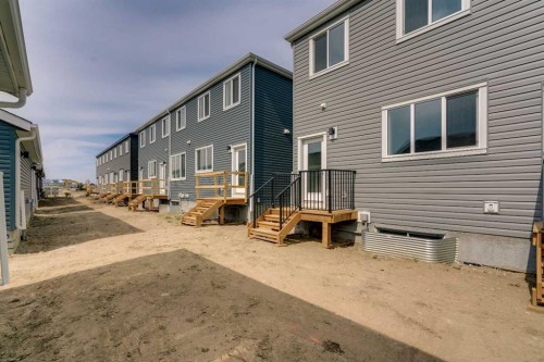 225 Heirloom Way Se, Calgary, AB - Outdoor With Exterior