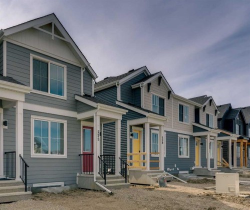 225 Heirloom Way Se, Calgary, AB - Outdoor With Facade