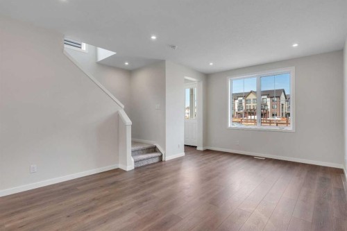 225 Heirloom Way Se, Calgary, AB - Indoor Photo Showing Other Room