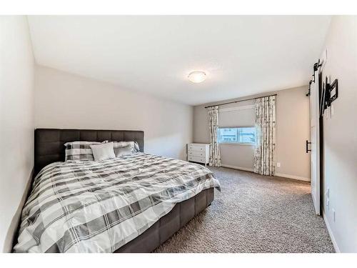 222 Cranston Gate Se, Calgary, AB - Indoor Photo Showing Bedroom