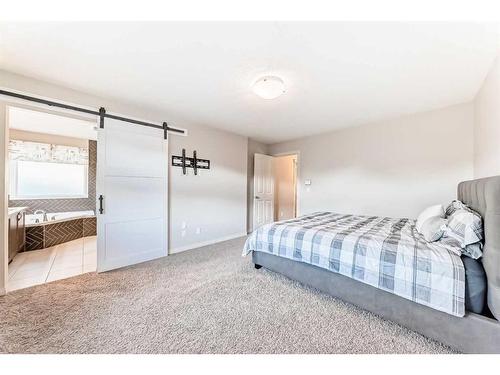 222 Cranston Gate Se, Calgary, AB - Indoor Photo Showing Bedroom