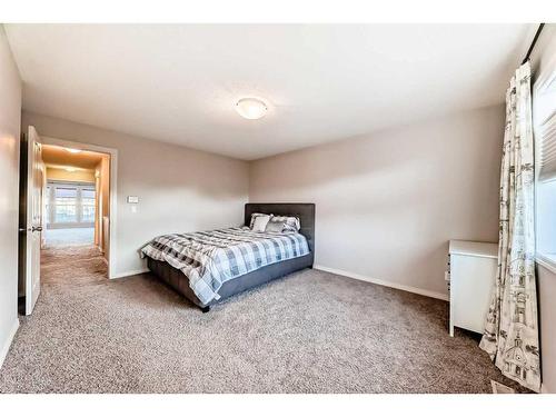 222 Cranston Gate Se, Calgary, AB - Indoor Photo Showing Bedroom