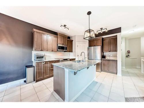 222 Cranston Gate Se, Calgary, AB - Indoor Photo Showing Kitchen With Upgraded Kitchen