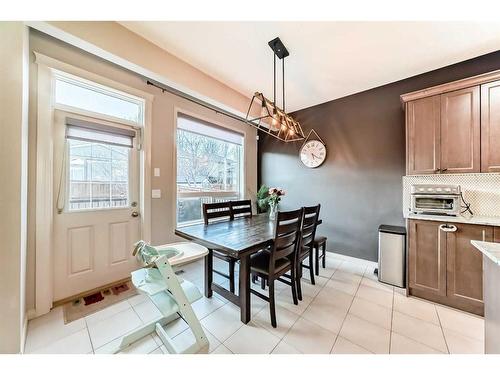 222 Cranston Gate Se, Calgary, AB - Indoor Photo Showing Dining Room