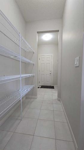 222 Cranston Gate Se, Calgary, AB - Indoor With Storage