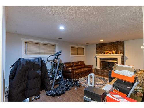 3439 56 Street Ne, Calgary, AB - Indoor With Fireplace