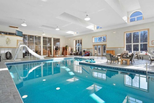 31027 Range Road 50, Rural Mountain View County, AB - Indoor Photo Showing Other Room With In Ground Pool