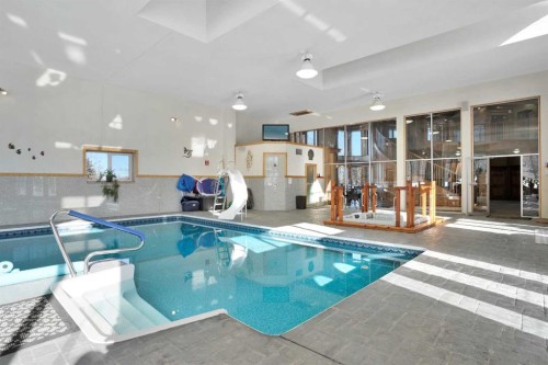 31027 Range Road 50, Rural Mountain View County, AB - Indoor Photo Showing Other Room With In Ground Pool