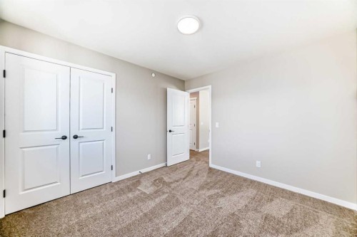 62 Hotchkiss Row Se, Calgary, AB - Indoor Photo Showing Other Room
