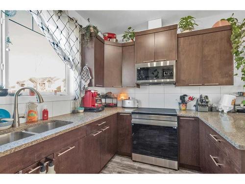 53 Skyview Ranch Manor Ne, Calgary, AB - Indoor Photo Showing Kitchen With Double Sink