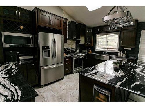 207 Hawkview Manor Circle Nw, Calgary, AB - Indoor Photo Showing Kitchen With Stainless Steel Kitchen