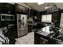 207 Hawkview Manor Circle Nw, Calgary, AB  - Indoor Photo Showing Kitchen With Stainless Steel Kitchen 