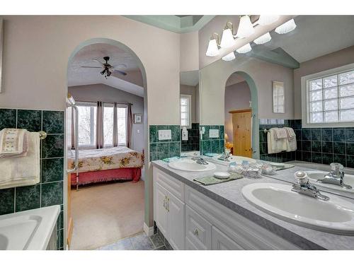 4 Evergreen Way Sw, Calgary, AB - Indoor Photo Showing Bathroom