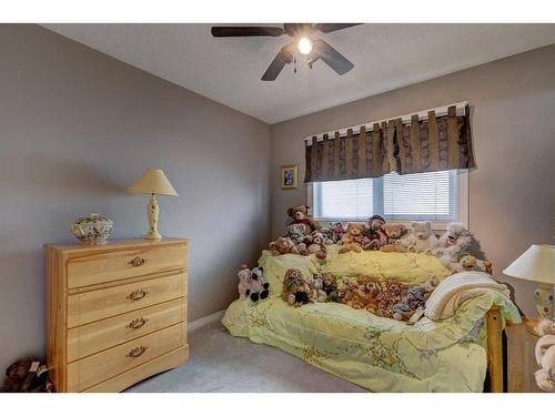 4 Evergreen Way Sw, Calgary, AB - Indoor Photo Showing Bedroom