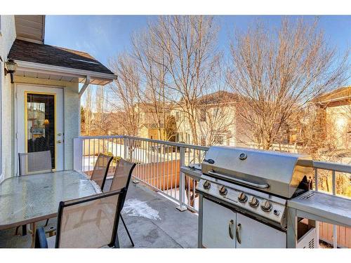 4 Evergreen Way Sw, Calgary, AB - Outdoor With Deck Patio Veranda With Exterior