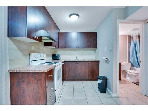 22 Saddleback Road Ne, Calgary, AB - Indoor Photo Showing Kitchen With Double Sink