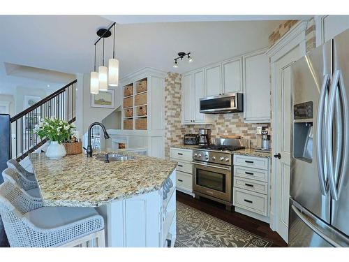 44 Tuscany Springs Circle Nw, Calgary, AB - Indoor Photo Showing Kitchen With Double Sink With Upgraded Kitchen