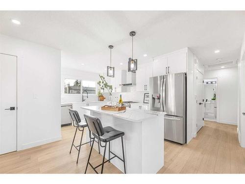 471 Cedarpark Drive Sw, Calgary, AB - Indoor Photo Showing Kitchen With Upgraded Kitchen