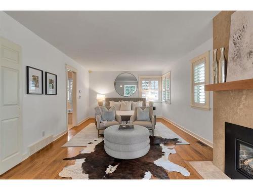 4316 Anne Avenue Sw, Calgary, AB - Indoor Photo Showing Living Room With Fireplace