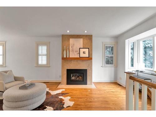 4316 Anne Avenue Sw, Calgary, AB - Indoor Photo Showing Living Room With Fireplace