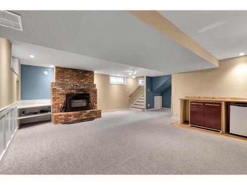 4316 Anne Avenue Sw, Calgary, AB - Indoor With Fireplace