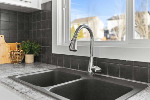 17 Welch Crescent, Okotoks, AB - Indoor Photo Showing Kitchen With Double Sink