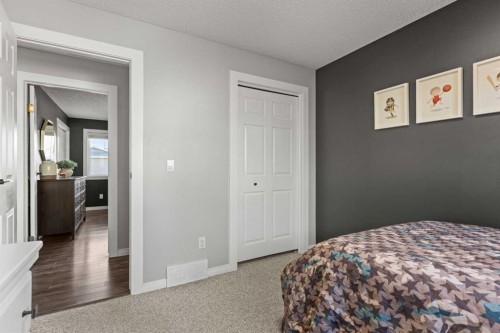 17 Welch Crescent, Okotoks, AB - Indoor Photo Showing Bedroom