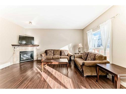 50 Everwoods Link Sw, Calgary, AB - Indoor Photo Showing Living Room With Fireplace