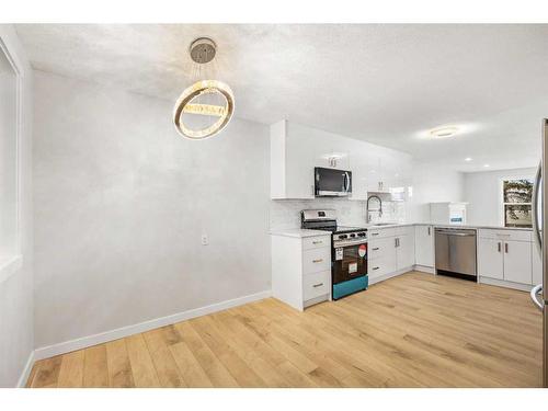 92 Templeby Road Ne, Calgary, AB - Indoor Photo Showing Kitchen