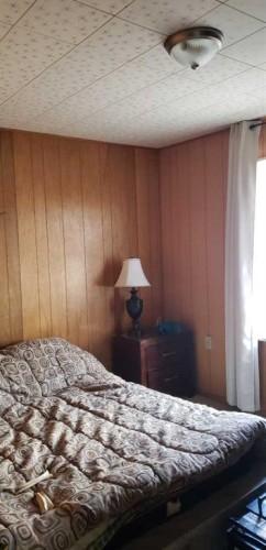 216 3 Avenue North, Champion, AB - Indoor Photo Showing Bedroom