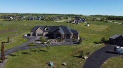124 Grizzly Rise  Rural Rocky View County, AB T4C 0B5