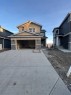 503 Rivercrest View, Cochrane, AB  - Outdoor With Facade 