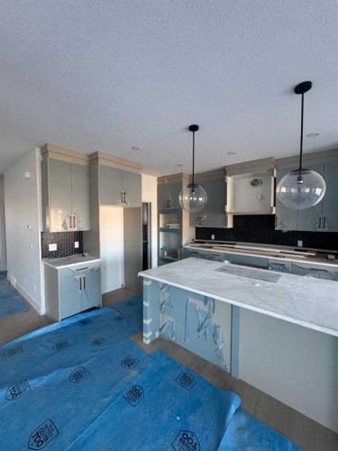 503 Rivercrest View, Cochrane, AB - Indoor Photo Showing Kitchen