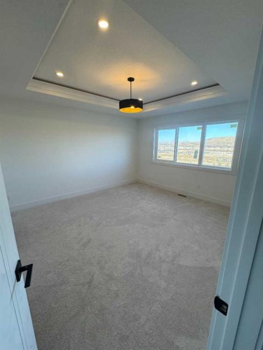 503 Rivercrest View, Cochrane, AB - Indoor Photo Showing Other Room