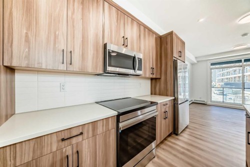 8202-1802 Mahogany Boulevard Se, Calgary, AB - Indoor Photo Showing Kitchen